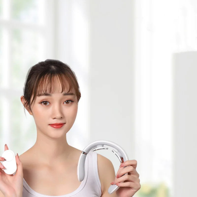 Woman holding the lightweight neck massager